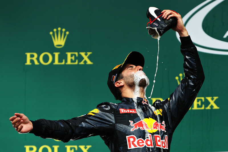 Podium: Daniel Ricciardo, Red Bull Racing celebrates his second position drinking champagne from his