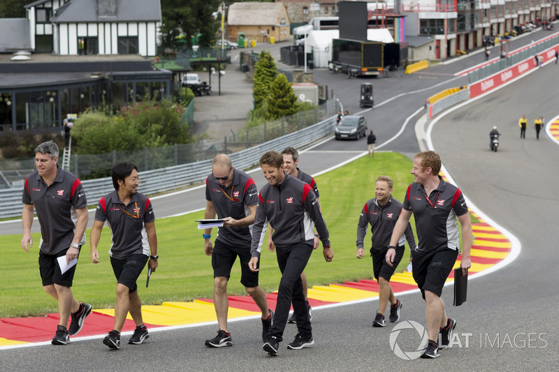 Romain Grosjean, Haas F1 Team, walks the track with the team