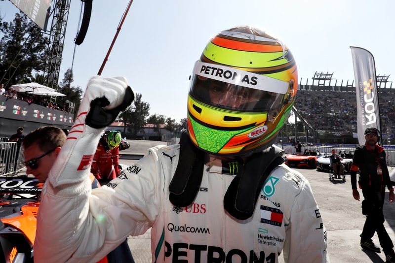 Esteban Gutierrez (MEX) celebrates after winning a race