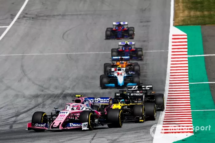Lance Stroll, Racing Point RP19, leads Daniel Ricciardo, Renault F1 Team R.S.19, Romain Grosjean, Haas F1 Team VF-19, and Robert Kubica, Williams FW42