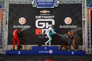 Alex Palou, Chip Ganassi Racing Honda, Will Power, Team Penske Chevrolet, Felix Rosenqvist, Arrow McLaren Chevrolet celebrates on the podium with champagne