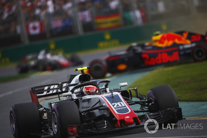 Kevin Magnussen, Haas F1 Team VF-18 Ferrari, a spinning Max Verstappen, Red Bull Racing RB14 Tag Heuer