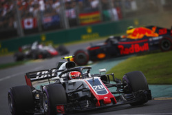 Kevin Magnussen, Haas F1 Team VF-18 Ferrari, a spinning Max Verstappen, Red Bull Racing RB14 Tag Heu