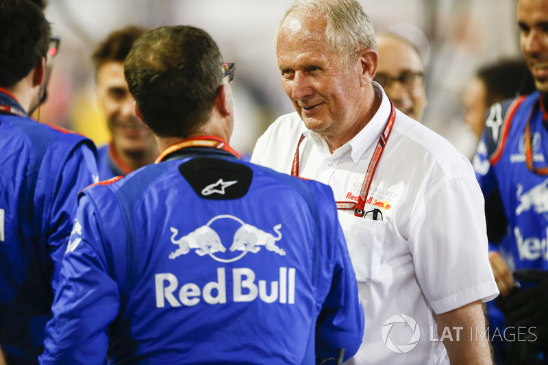 Helmut Markko, Consultant, Red Bull Racing, congratulates the Toro Rosso team on a 4th placed finish