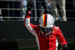 Race winner Sebastian Vettel, Ferrari, celebrates in Parc Ferme