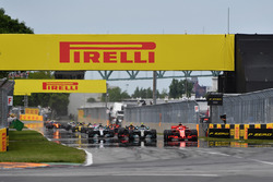 Sebastian Vettel, Ferrari SF71H leads at the start of the race