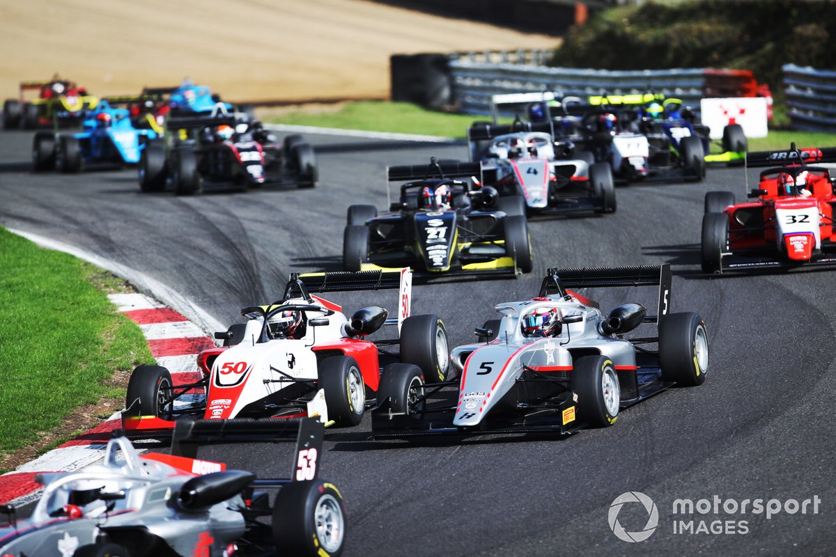 Granfors and Browning go wheel to wheel at Brands Hatch in one of many good-natured duels the pair enjoyed this year