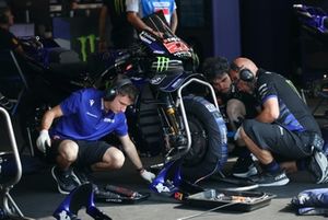 The Factory Yamaha mechanics prepare the bikes.