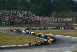 Nigel Mansell, Williams FW11B Honda; Teo Fabi, Benetton B187 Ford; Ayrton Senna, Lotus 99T Honda