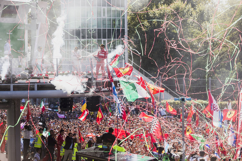 Second place Valtteri Bottas, Mercedes AMG F1, Race winner Third place Lewis Hamilton, Mercedes AMG F1 Sebastian Vettel, Ferrari, celebrate on the podium, Champagne