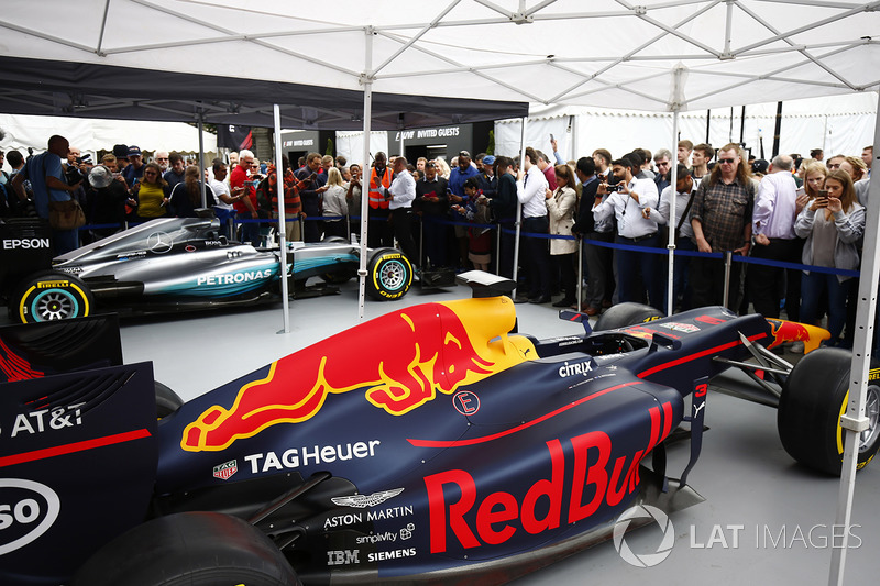 The Red Bull Racing RB13 alongside the Mercedes AMG F1 W08 in the display area