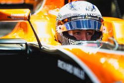 Fernando Alonso, McLaren, in cockpit with helmet visor raised