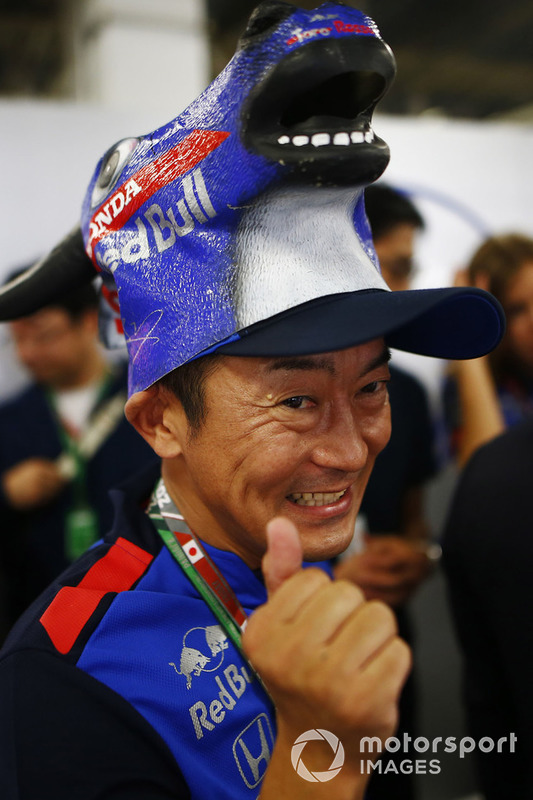 A Toro Rosso Honda fan wears a novel hat.