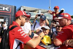 Sebastian Vettel, Ferrari signs autographs for the fans