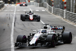 Lance Stroll, Williams FW41, leads Romain Grosjean, Haas F1 Team VF-18