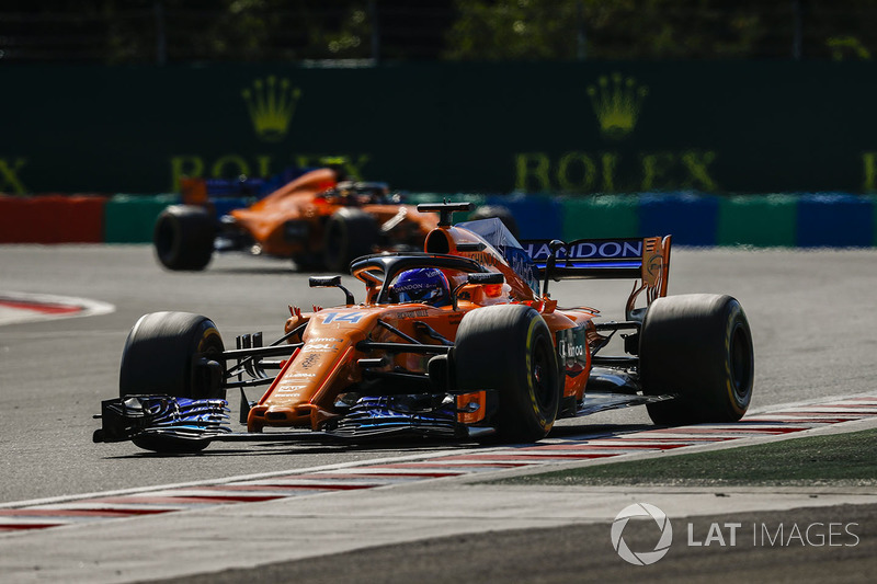 Fernando Alonso, McLaren MCL33, leads Stoffel Vandoorne, McLaren MCL33