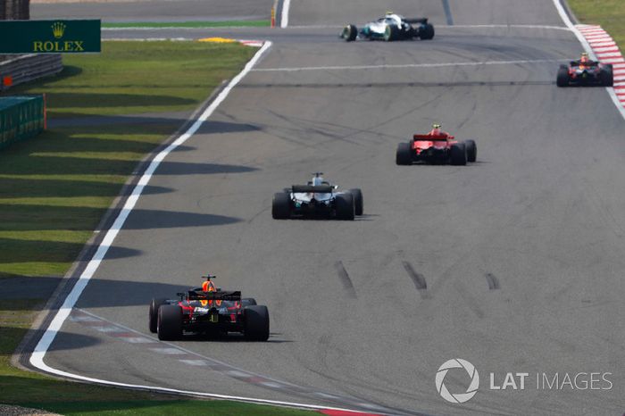 Kimi Raikkonen, Ferrari SF71H, Lewis Hamilton, Mercedes AMG F1 W09, and Daniel Ricciardo, Red Bull Racing RB14 Tag Heuer