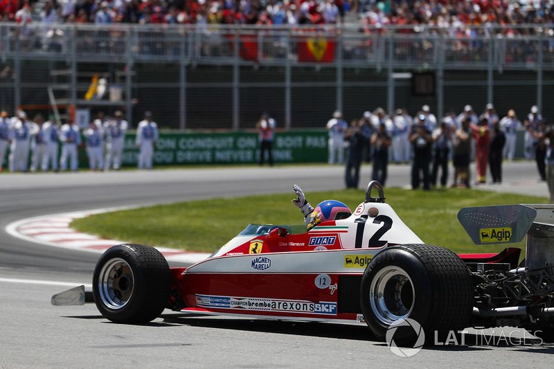 Jacques Villeneuve drives the Ferrari 312T3 driven by his father Gilles Villeneuve on a demonstration lap