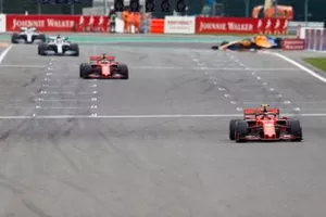 Charles Leclerc, Ferrari SF90, leads Sebastian Vettel, Ferrari SF90, and Lewis Hamilton, Mercedes AMG F1 W10