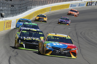 Kyle Busch, Joe Gibbs Racing, Toyota Camry M&M's and Jimmie Johnson, Hendrick Motorsports, Chevrolet Camaro Lowe's for Pros