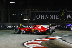 The damaged car of Sebastian Vettel, Ferrari SF70H