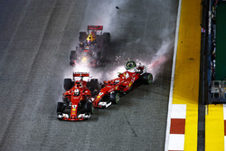 Sparks fly as Kimi Raikkonen, Ferrari SF70H hits Max Verstappen, Red Bull Racing RB13 and Sebastian Vettel, Ferrari SF70H