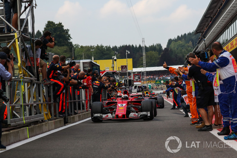 Sebastian Vettel, Ferrari SF70H, arrives to celebrate in parc ferme