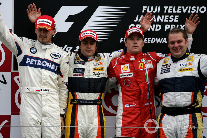 Robert Kubica, BMW Sauber with Fernando Alonso, Renault and Kimi Raikkonen, Ferrari on the podium 