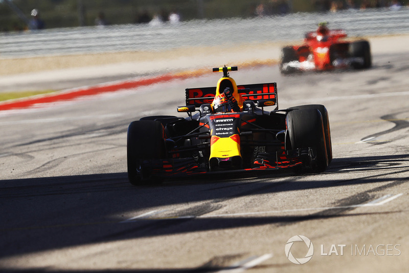 Max Verstappen, Red Bull Racing RB13, celebrates as he crosses the line ahead of Kimi Raikkonen, Ferrari SF70H