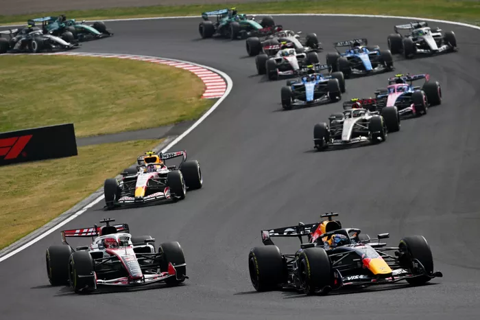 Max Verstappen, Red Bull Racing, Esteban Ocon, Haas F1 Team