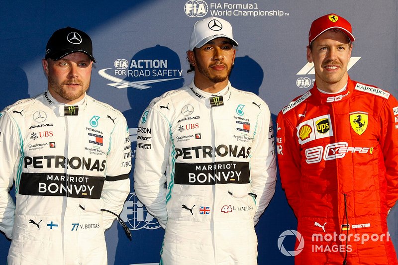 Valtteri Bottas, Mercedes AMG F1, Pole Sitter Lewis Hamilton, Mercedes AMG F1 and Sebastian Vettel, Ferrari in Parc Ferme