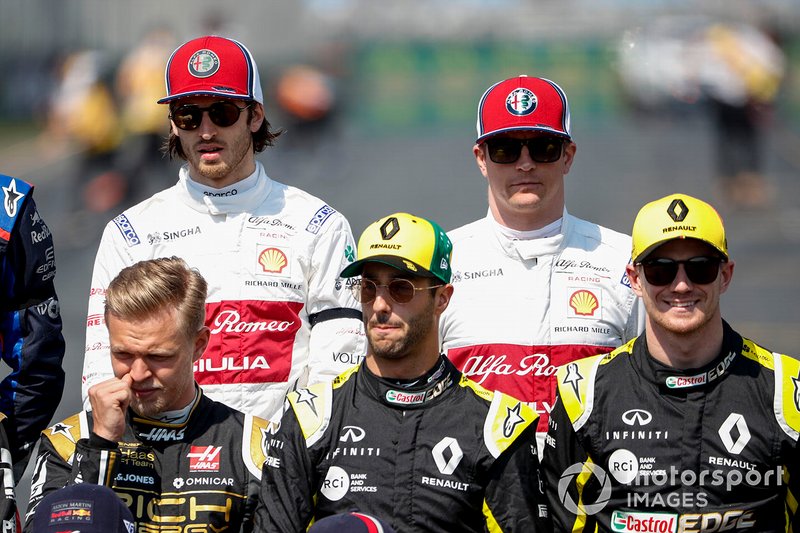 Antonio Giovinazzi, Alfa Romeo Racing and Kimi Raikkonen, Alfa Romeo Racing stand behind Kevin Magnussen, Haas F1, Daniel Ricciardo, Renault F1 Team, and Nico Hulkenberg, Renault F1 Team