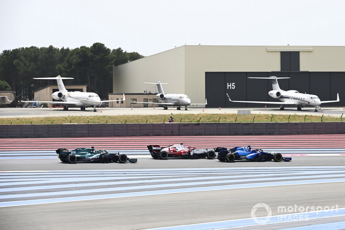 George Russell, Williams FW43B, Kimi Raikkonen, Alfa Romeo Racing C41, and Lance Stroll, Aston Martin AMR21