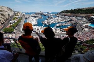 McLaren fans watch from a balcony during the F1 Grand Prix of Monaco
