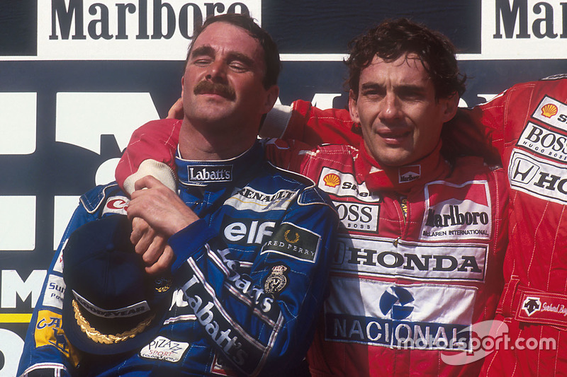 Podium: second place and world champion Nigel Mansell, Williams Renault, race winner Ayrton Senna, Mclaren Honda