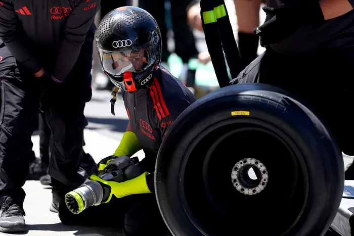 Audi F1 Team pit stop practice.