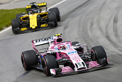Esteban Ocon, Force India VJM11, leads Nico Hulkenberg, Renault Sport F1 Team R.S. 18