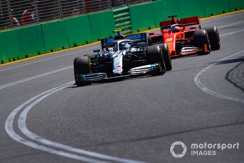 Valtteri Bottas, Mercedes AMG W10, leads Sebastian Vettel, Ferrari SF90