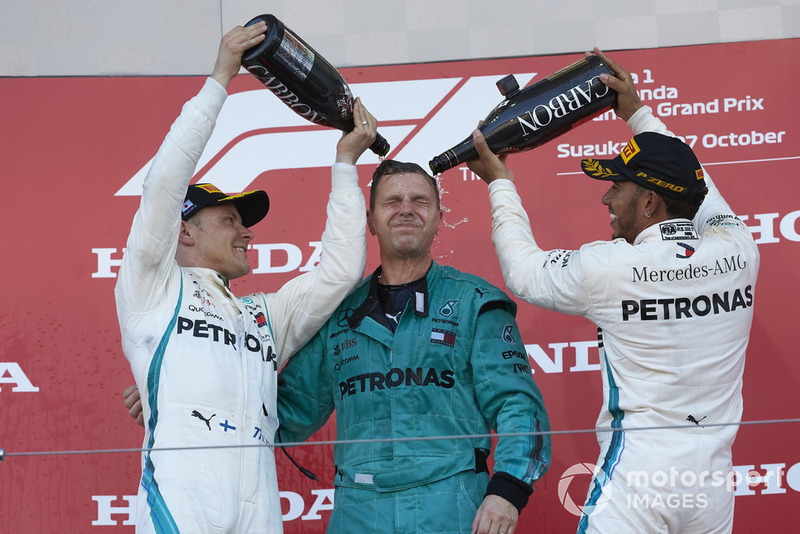 Lewis Hamilton, Mercedes AMG F1, on the podium with Valtteri Bottas, Mercedes AMG F1, spraying champagne