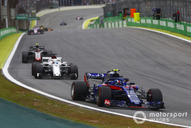 Pierre Gasly, Scuderia Toro Rosso STR13, leads Marcus Ericsson, Sauber C37, and Kevin Magnussen, Haas F1 Team VF-18