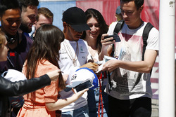 Lewis Hamilton, Mercedes AMG F1, signs autographs for fans