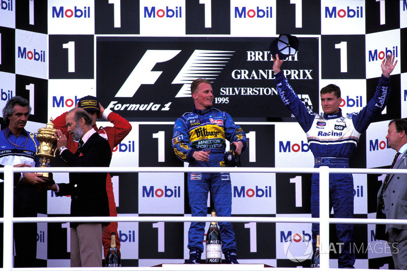 The podium finishers, Flavio Briatore, Benetton Team Principal, Prince Michael of Kent, Jean Alesi, Ferrari 2nd, Johnny Herbert, Benetton 1st, David Coulthard, Williams 3rd, Kenneth Clarke, MP