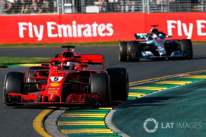 Sebastian Vettel, Ferrari SF71H leads Lewis Hamilton, Mercedes-AMG F1 W09