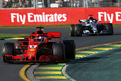 Sebastian Vettel, Ferrari SF71H leads Lewis Hamilton, Mercedes-AMG F1 W09