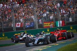 Lewis Hamilton, Mercedes AMG F1 W09, leads Kimi Raikkonen, Ferrari SF71H, Sebastian Vettel, Ferrari SF71H, Kevin Magnussen, Haas F1 Team VF-18 Ferrari, Max Verstappen, Red Bull Racing RB14 Tag Heuer, and Romain Grosjean, Haas F1 Team VF-18 Ferrari, at the start