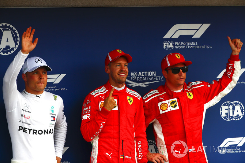 Le deuxième, Valtteri Bottas, Mercedes AMG F1, le poleman Sebastian Vettel, Ferrari, et le troisième, Kimi Raikkonen, Ferrari