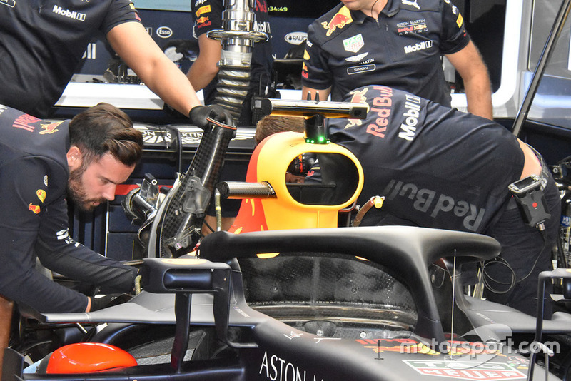 Red Bull Racing team members at work