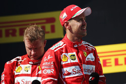 Podium: race winner Sebastian Vettel, Ferrari, second place Kimi Raikkonen, Ferrari