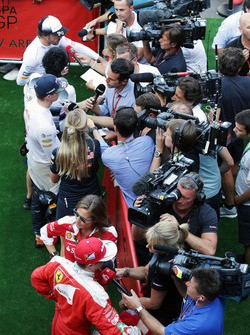 (Top to Bottom): Fernando Alonso, McLaren; Max Verstappen, Red Bull Racing; and Kimi Raikkonen, Ferrari, with the media