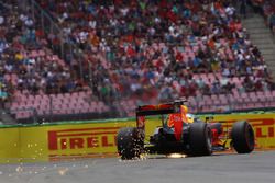 Max Verstappen, Red Bull Racing RB12 sends sparks flying